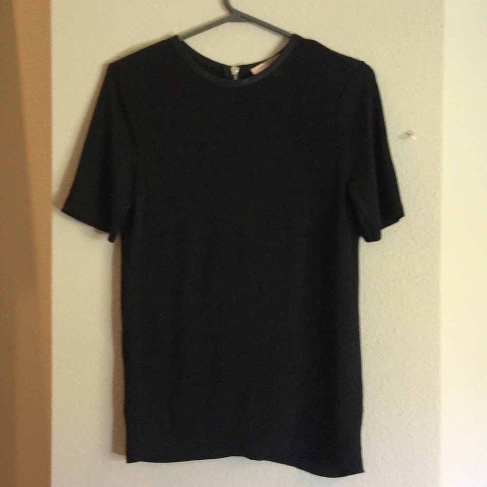 Black shirt, zip back, 100% rayon, size med.